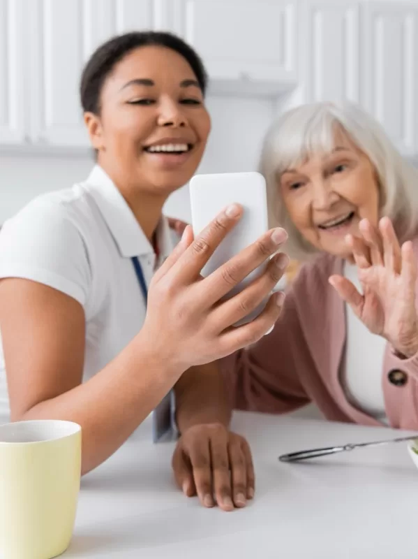 {{site_name}} support worker helping participant
